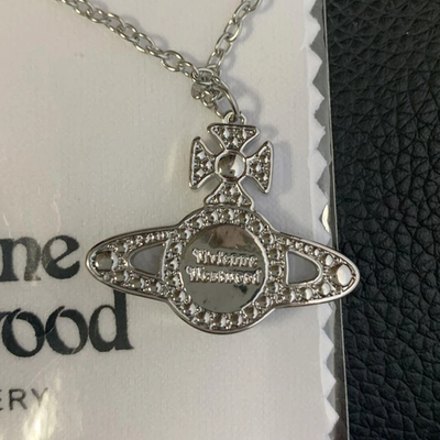 Vivienne Westwood necklace, planet motif, silver, chain 52cm, box included