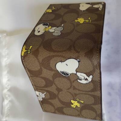 COACH x PEANUTS bi-fold wallet Signature x Snoopy brownsp