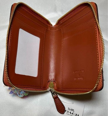 Coach bi-fold mini wallet Snoopy collaboration signature CE704 IMT1O