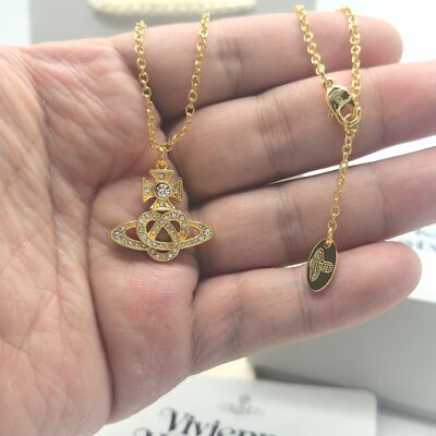 check description Vivienne Westwood Knot Heart Hollow Saturn Necklace Pendant
