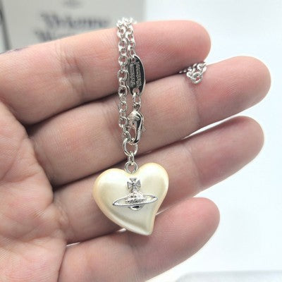 check description Vivienne Westwood FLORENTIA Mother of Pearl Heart Bracelet