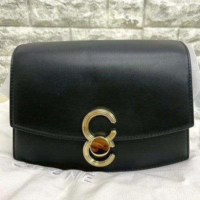 CAFUNE Pendulum Shoulder Bag Crossbody bag Leather Black Gold hardware