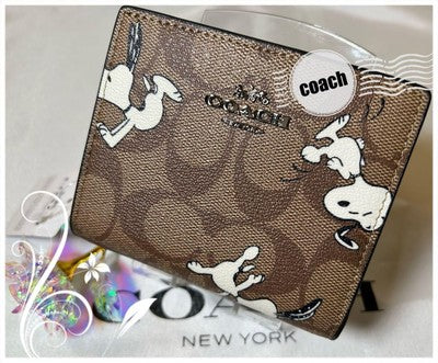 Coach bi-fold mini wallet Snoopy collaboration signature CE704 IMT1O
