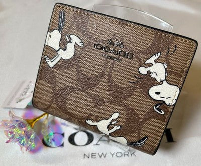 Coach bi-fold mini wallet Snoopy collaboration signature CE704 IMT1O
