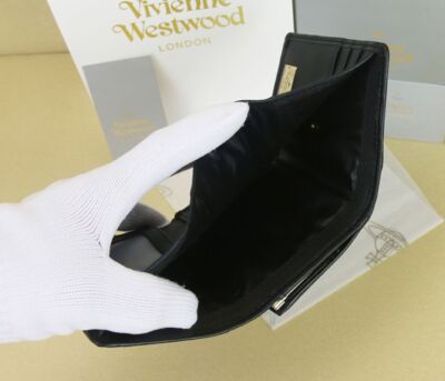 Vivienne Westwood clasp wallet Multi-Card Pocket  Snap button closure Leather