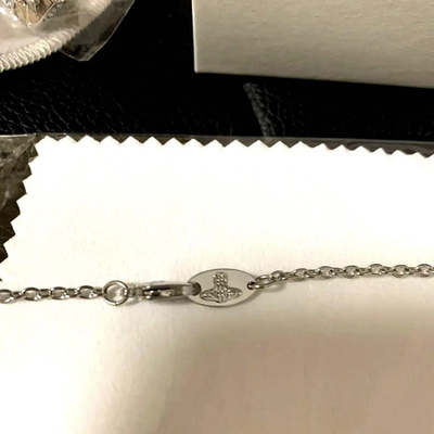 Vivienne Westwood necklace, planet motif, silver, chain 52cm, box included