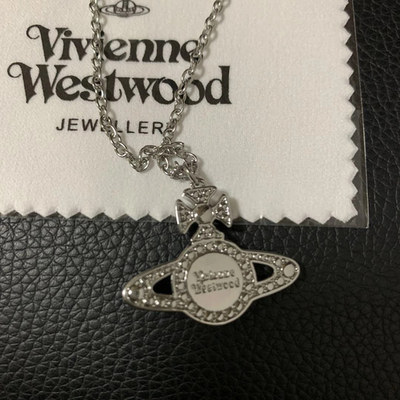 Vivienne Westwood necklace, planet motif, silver, chain 52cm, box included