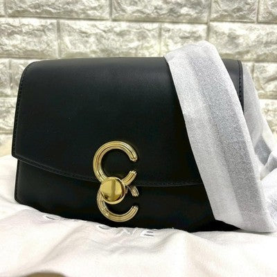 CAFUNE Pendulum Shoulder Bag Crossbody bag Leather Black Gold hardware