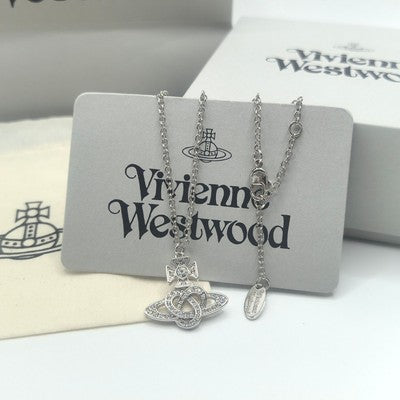 check description Vivienne Westwood Knot Heart Hollow Saturn Necklace Pendant