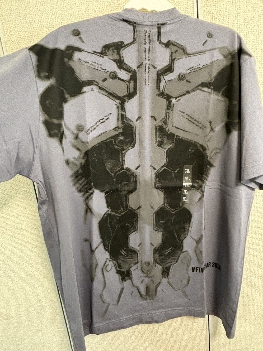 bargain price UNIQLO METAL GEAR SOLID ARCHIVE GRAPHIC UT T-SHIRT in Hand Grey