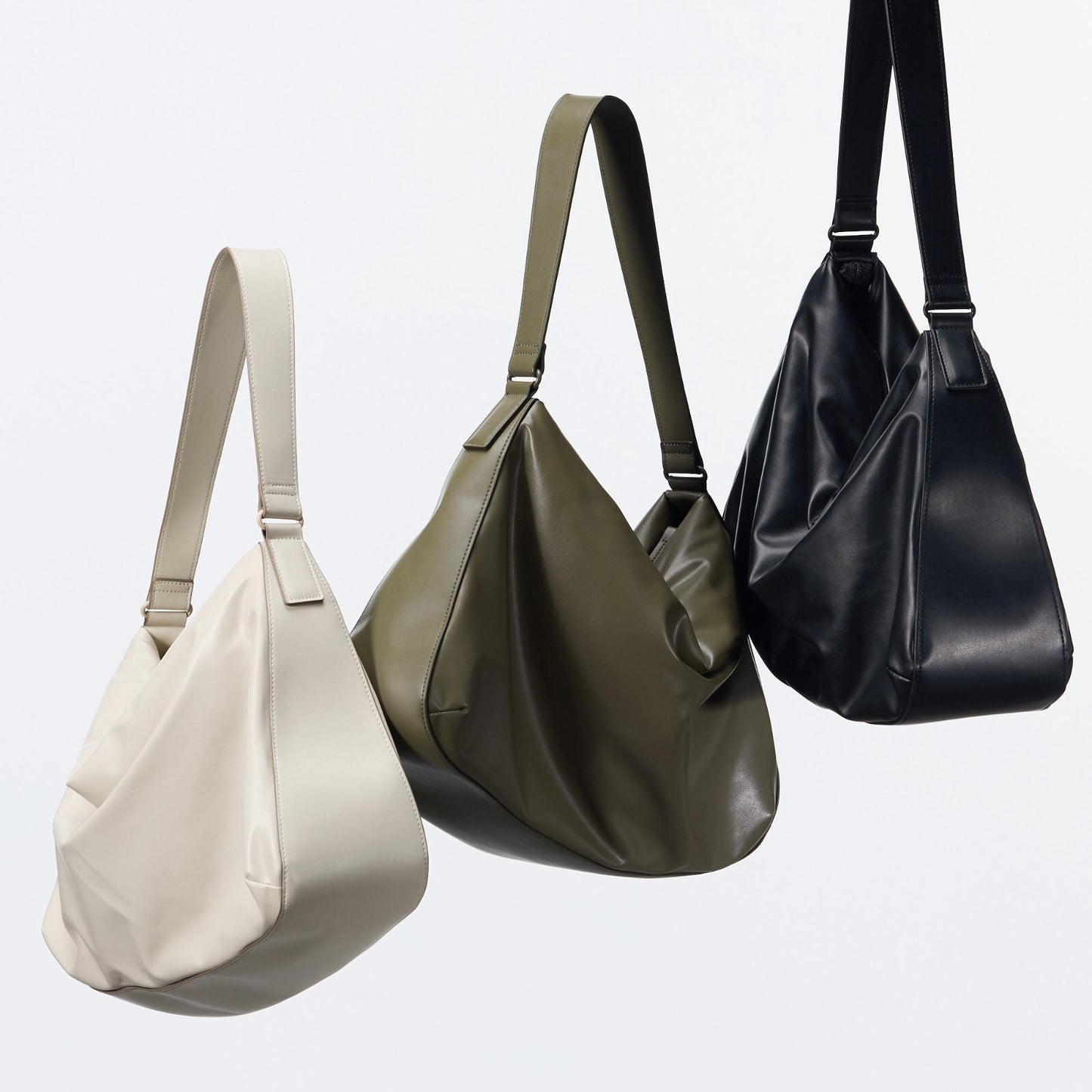 bargain price Uniqlo C Faux Leather Puffy Bag Japan Authentic 468834sp