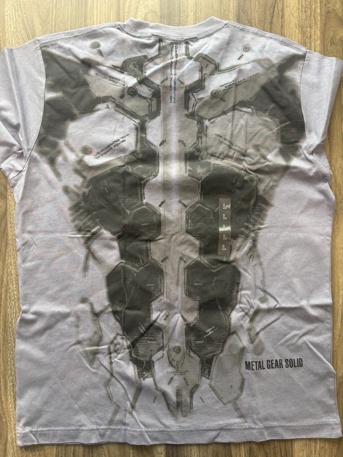 bargain price UNIQLO METAL GEAR SOLID ARCHIVE GRAPHIC UT T-SHIRT in Hand Grey