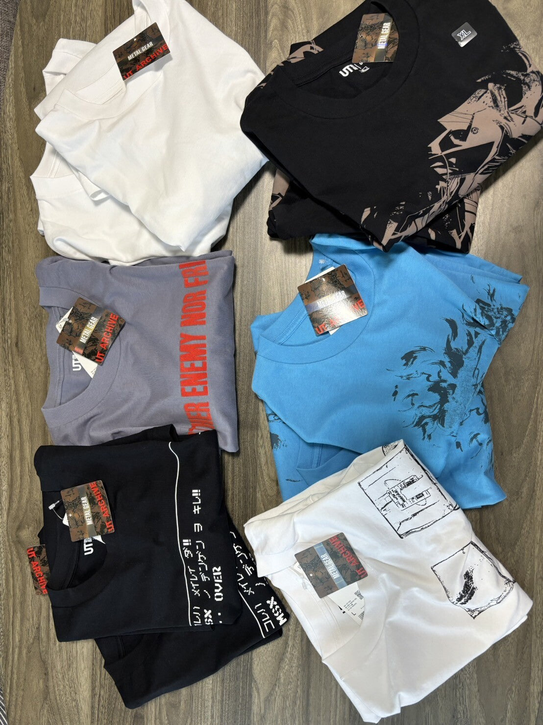 bargain price UNIQLO METAL GEAR SOLID ARCHIVE GRAPHIC UT T-SHIRT in Hand Grey